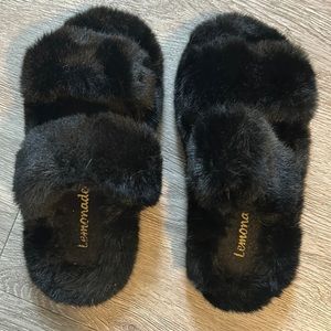 Black fuzzy slippers